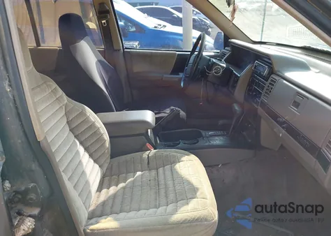 1993 Jeep Grand Cherokee Laredo from USA, damaged, VIN 1J4GZ58Y3PC508056